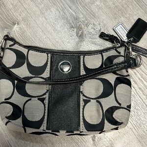 Brand New Coach style bag. Black and tan.